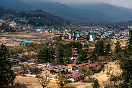 View of rinpong dzong monastery and the surrounding landscape of paro, bhutan in daylight