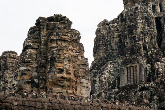 Exploring the stone faces of Bayon Temple in Siem Reap, Cambodia