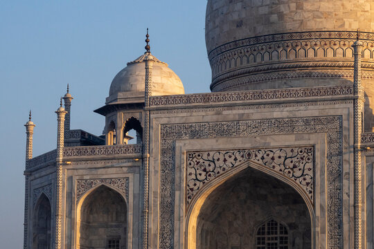 Detail of Taj Mahal structure at sunrise with clear sky in Agra, Uttar Pradesh, India