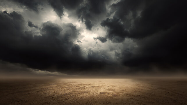 A dramatic scene of dark clouds looming over a barren landscape, showcasing nature's raw power and beauty.