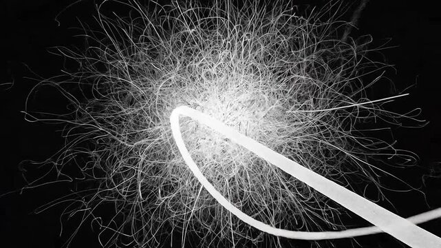 Abstract white lines on a black background create a dynamic and artistic design element