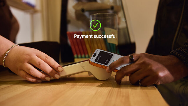 Smartphone tap payment on card reader with large successful confirmation overlay. Concept of POS checkout, NFC transaction, retail payment, fintech UX and cashless commerce.