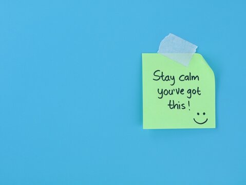 Stay calm you&rsquo;ve got this message handwritten on green adhesive note on blue background. Perfect for concepts of mental health, workplace motivation, exam stress, and positive affirmation