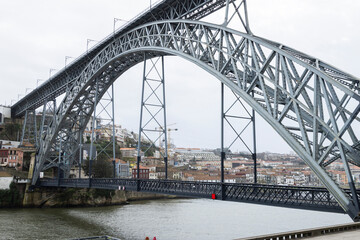 Fototapeta premium Dom Luís I Bridge Porto Portugal iconic metal structure over Douro River with cityscape