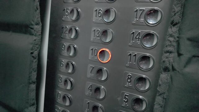 Elevator Floor Buttons Panel with Floor 10 Lit Up, Brazil