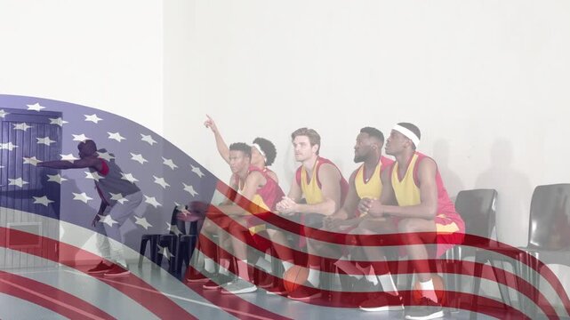Bench players reacting to on-court play, standing and celebrating with ball and flag overlay