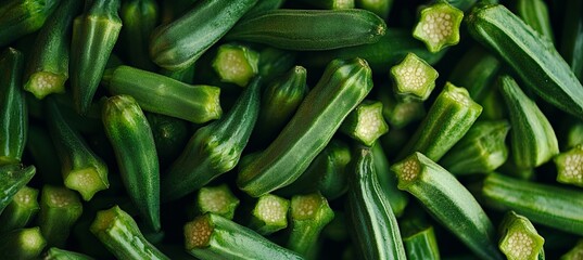 Fototapeta premium Close-Up of Fresh Organic Okra Pods in a Vibrant Green Garden, Showcasing Healthy Crops and Nature