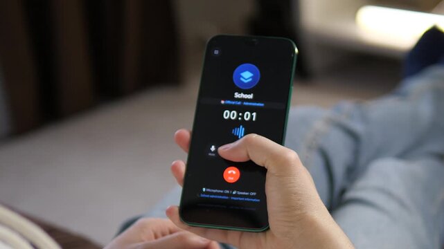 Parent answering an official call from school on a smartphone. Features a realistic UI with an active call timer. Perfect for education-themed videos, family communication, and school administration