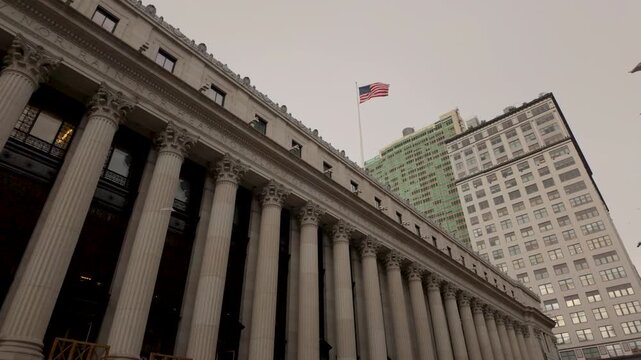 Travelling. shot of the the post office of New York with American flag flies over
