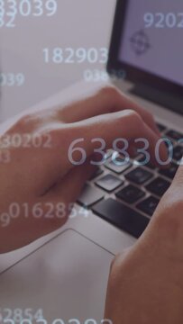 Vertical video: Fingers pressing keys, hands typing, digits drifting over keyboard visualizing data