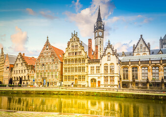 Obraz premium Old buildings on Graslei embankment at day, Ghent, Belgium
