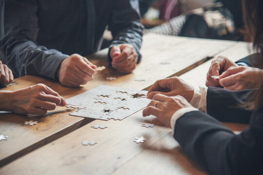 Unified synergy assembly business game implementation multiple puzzle meeting. Business connections strategy synergy team solution. Implement puzzle improve communication solve synergy organize team