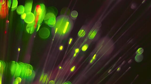 Microscopic view of glowing bacteria and microorganisms on dark background