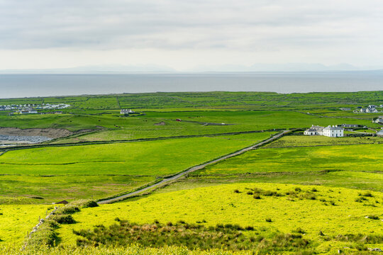 Coastal landscape near Doonagore Castle and Doolin, County Clare, Ireland. Scenic Atlantic farmland on the Wild Atlantic Way with views toward the Aran Islands.