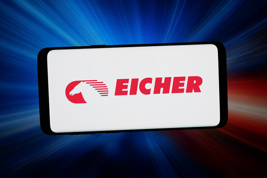 Stuttgart, Germany - 05-08-2026: In this photo illustration, the logo of automotive company Eicher Motors Limited is displayed on a smartphone in front of abstract background on computer screen.