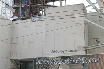Fototapeta premium Downtown Bath and Tile delivery truck parked outside the Art Gallery of Ontario, 317 Dundas St W and McCaul St, Toronto