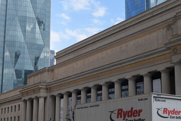 Fototapeta premium Ryder delivery truck outside Union Station with view of CIBC Square; looking east, south side, Front St W, Toronto
