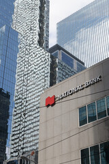 Fototapeta premium view of National Bank sign outside 121 King St W, Floor 1 of Roserock Place, Toronto