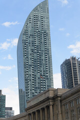 Fototapeta premium west elevation of L Tower, a residential skyscraper, designed by Daniel Libeskind, located at 8 The Esplanade, Toronto