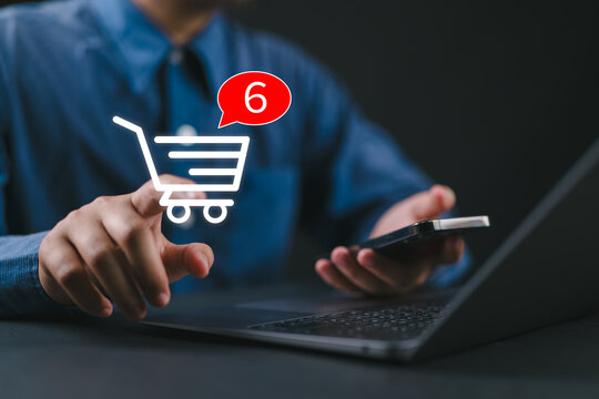 Person pointing at shopping cart graphic with notification badge, representing digital shopping wishlist, ecommerce activity, saved products, and online purchasing behavior.