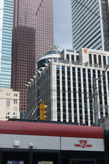 Fototapeta premium looking southeast from York St and Adelaide St W with view of Northbridge Insurance sign and corporate offices in the Financial District, Toronto