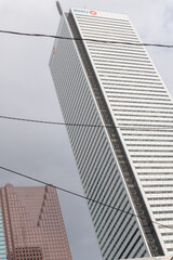 Fototapeta premium abstract, oblique angle view of First Canadian Place, headquarters of BMO Group, and defocused view of Scotia Plaza, Toronto