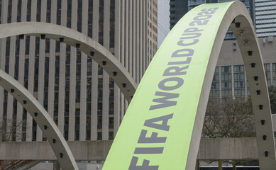 Fototapeta premium FIFA World Cup 2026 tournament branding or host city dressing on Arches at Nathan Phillips Square, Toronto City Hall