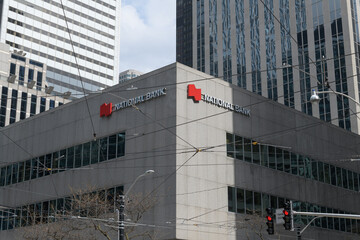 Fototapeta premium view of National Bank sign outside 121 King St W, Floor 1 of Roserock Place, Toronto