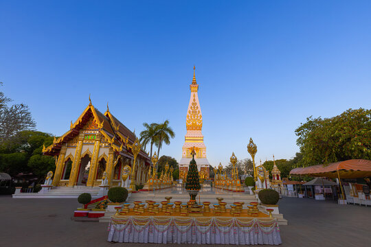 Wat Phra That Phanom Woramahawihan at Twilight, Nakhon Phanom, Thailand,A stunning wide-angle view of Phra That Phanom, the sacred pagoda containing the Buddha's breastbone relic.
