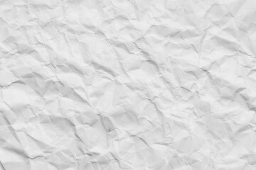 Fototapeta premium White crumpled paper texture background for design and decoration.