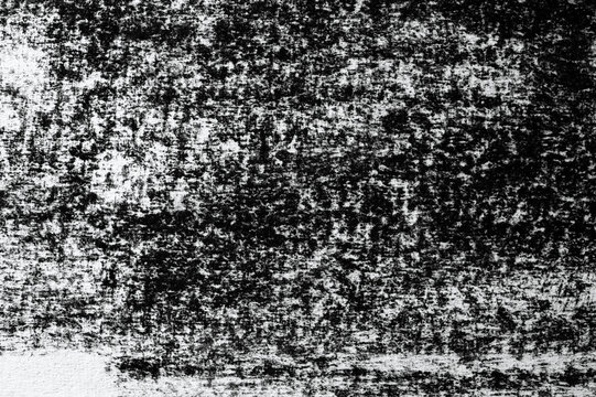 Distressed graphite paper texture with rough monochrome grain isolated on transparent background.