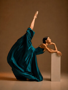 Graceful ballerina posing in a dramatic emerald gown with extended leg in a minimalist studio, elegant contemporary dance and fashion concept.