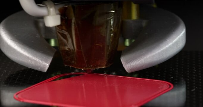 The process of 3D printing the first layer. Printing on a сartesian kinematics printer.