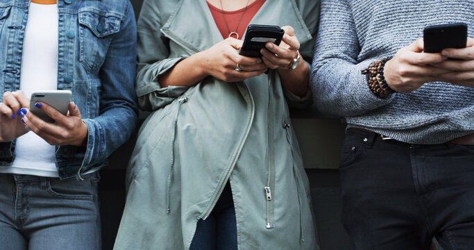 Business people, hands and line with phone for job search, career opportunity or network. Group, users or scrolling with smartphone, mobile app or research in row for online hiring or recruitment