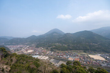 Fototapeta premium Hazy Panoramic View of Tsuwano Town and Valley from Tsuwano Castle Ruins, Shimane