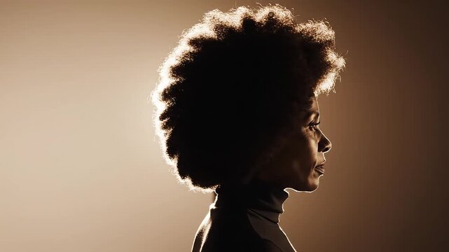 Profile of a person with afro hairstyle symbolizing the limitless potential of digital design