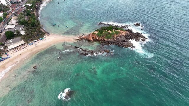 Aerial View Above Parrot Rock And Mirissa Beach Sri Lanka
Aerial drone footage above Parrot Rock island and tropical Mirissa beach Sri Lanka May 2026.
