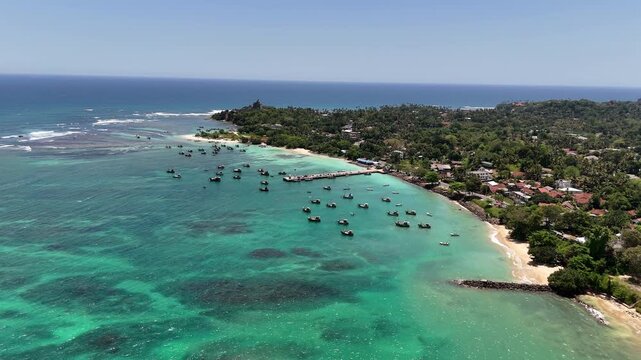 Aerial View Above Taprobane Island In Weligama Sri Lanka
Aerial drone footage above Taprobane Island and tropical Weligama coastline Sri Lanka May 2026.

