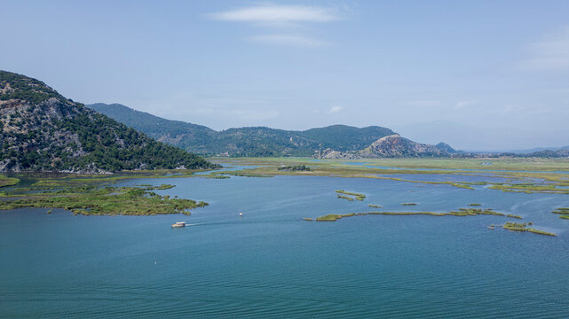 Iztuzu Beach, Turkey - May 9, 2026: Aerial drone view of Iztuzu Beach near Dalyan, Muğla Province, Turkey, showing the sandy coastline, turquoise Mediterranean Sea, Dalyan river