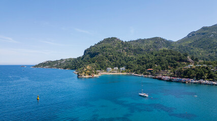 Fototapeta premium Turunch, Turkey - May 10, 2026: Aerial drone views from Turunç Bay, a popular coastal village near Marmaris in Muğla Province, Turkey.