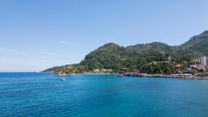 Fototapeta premium Turunch, Turkey - May 10, 2026: Aerial drone views from Turunç Bay, a popular coastal village near Marmaris in Muğla Province, Turkey.