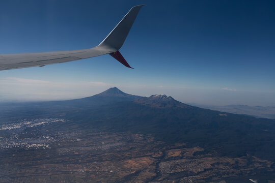 View from airplane window of the volcano Popocat&eacute;petl close to Mexico City airport