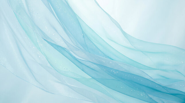 Airy sheer cyan blue flowing chiffon fabric with delicate sparkling dust particles floating in bright soft glowing background.