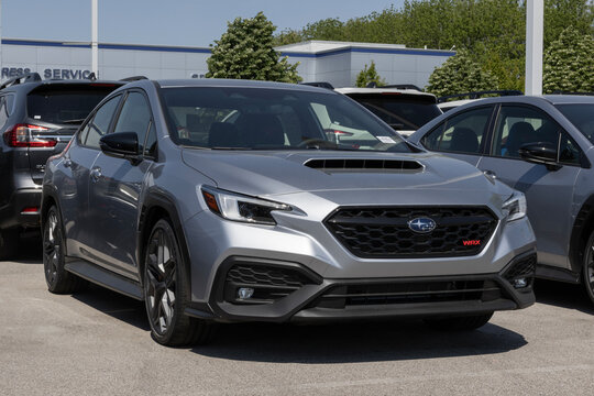 Subaru WRX 4-Door AWD Sports Car display. Subaru offers the WRX with a 2.4L Intercooled Turbocharged BOXER engine. MY:2026