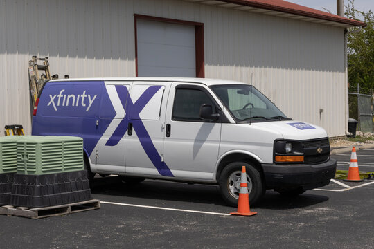 Xfinity branded Comcast work van. Comcast owns NBCUniversal, Xfinity Internet and DreamWorks Animation.