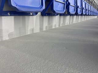 Fototapeta premium benches, stairs and an empty stadium for a sporting event