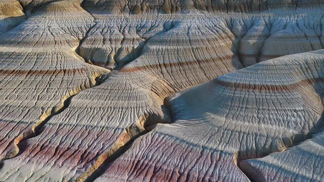 Kyzylkup is a natural landmark in the Mangystau region of Kazakhstan. It is a group of colorful hills with multicolored layered slopes that resemble the Italian dessert tiramisu