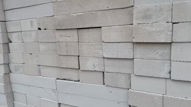 Stacked lightweight concrete blocks at a construction site