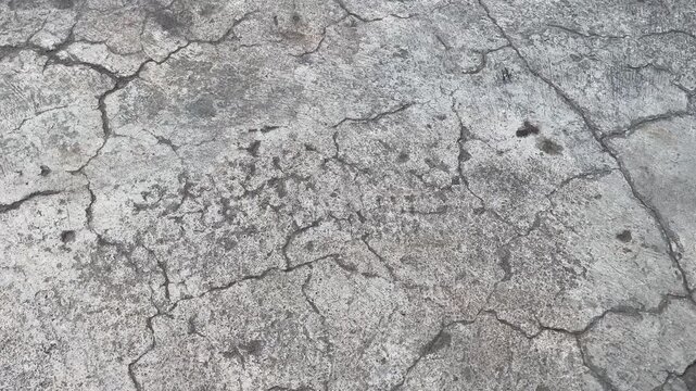 Cracked concrete texture background with rough surface