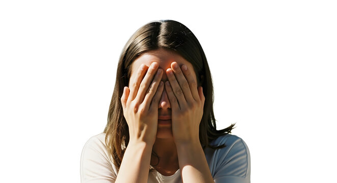 A young woman covering her face with her hands in a moment of distress or shame